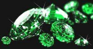 pile of cut emerald jewels