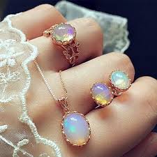 Moonstone gems on a woman's hand