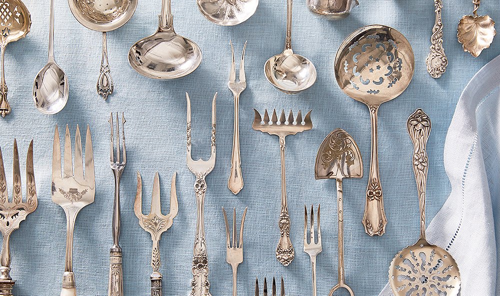 An assortment of unusual silver serving pieces