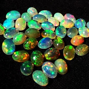 Opal, October's birthstone, is lightning in a gem